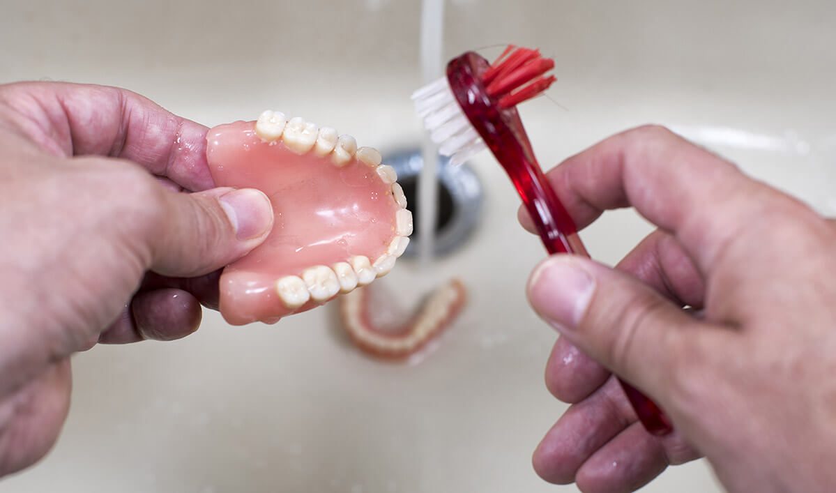Can You Brush Your Dentures with Regular Toothpaste? can you brush your dentures with regular toothpaste
