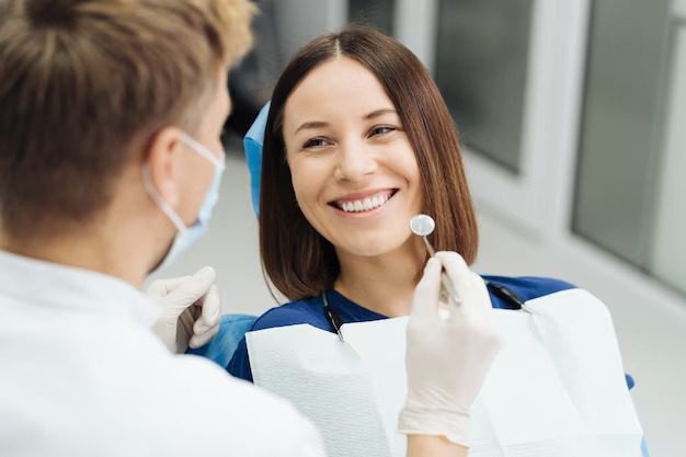 Best Cosmetic Dentistry in Scarsdale Happy patient showing off bright smile after cosmetic dentistry in Scarsdale