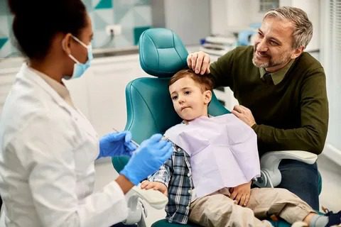 Top-Rated Pediatric Preventive Dentistry in Houston Child receiving dental sealants as part of pediatric preventive dentistry in Houston